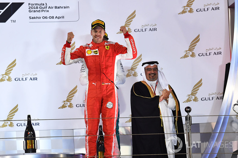 Race winner Sebastian Vettel, Ferrari celebrates on the podium