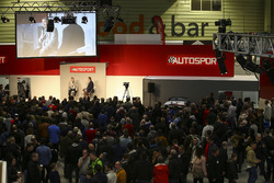 A scenic view of the show, with Nigel Mansell on the Autosport Stage