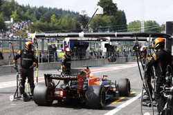 Fernando Alonso, McLaren MCL32, retires in the pits during the race
