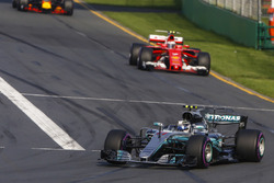Valtteri Bottas, Mercedes AMG F1 W08, leads Kimi Raikkonen, Ferrari SF70H, and Max Verstappen, Red Bull Racing RB13