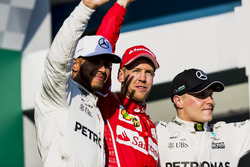 Lewis Hamilton, Mercedes AMG, deuxième, Sebastian Vettel, Ferrari, vainqueur et Valtteri Bottas, Mercedes AMG, troisième, sur le podium