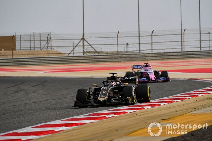 Romain Grosjean, Haas F1 Team VF-19 y Lance Stroll, Racing Point RP19 