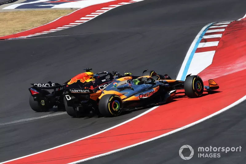 Max Verstappen, Red Bull Racing RB20, Lando Norris, McLaren MCL38, battle into turn 1