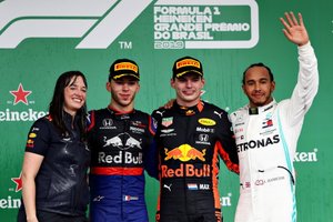 Podium: Racewinnaar Max Verstappen, Red Bull Racing, tweede plaats Pierre Gasly, Toro Rosso, derde plaats Lewis Hamilton, Mercedes AMG F1, Hannah Schmitz, Red Bull Racing strategy engineer