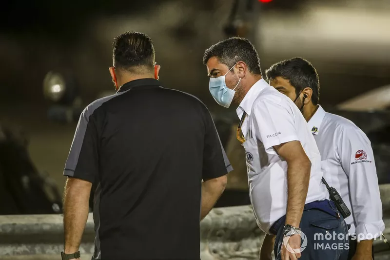 Michael Masi, Race Director, FIA, attends the scene of the huge crash for Romain Grosjean, Haas VF-20