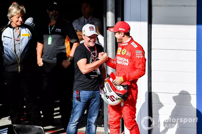 Rubens Barrichello y Sebastian Vettel, Ferrari celebran en Parc Ferme 