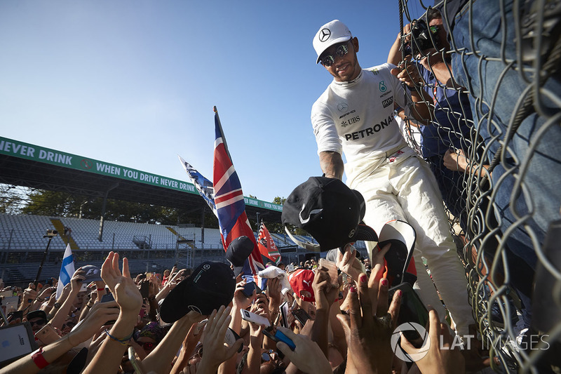 Lewis Hamilton, Mercedes AMG F1, signs autographs for fans