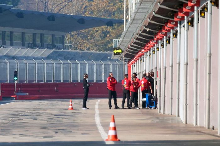Miembros del equipo Cadillac Racing en el pitlane
