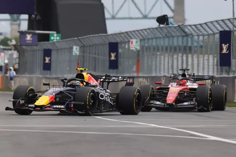 Charles Leclerc, Ferrari; Isack Hadjar, Red Bull Racing