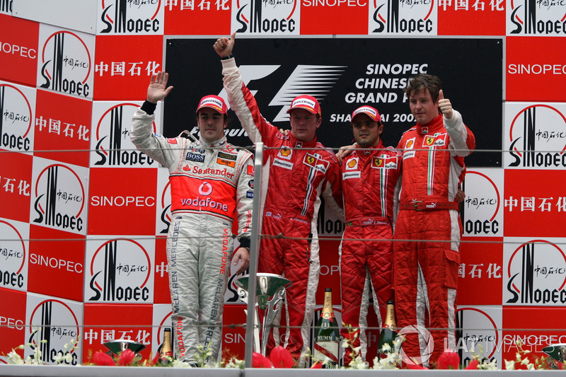 Podium: second place Fernando Alonso, McLaren, Race winner Kimi Raikkonen, Ferrari, third place Felipe Massa, Ferrari and Rob Smedley, Ferrari Race Engineer