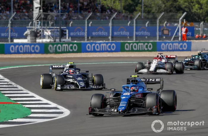 Esteban Ocon, Alpine A521, Pierre Gasly, AlphaTauri AT02, and Kimi Raikkonen, Alfa Romeo Racing C41