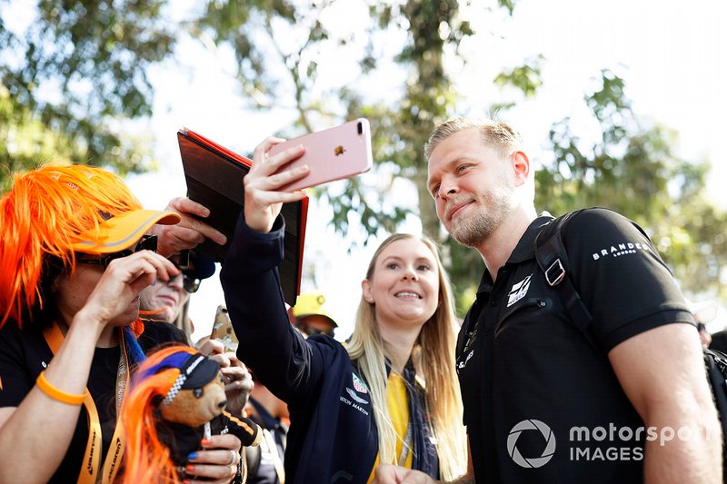 Kevin Magnussen, Haas F1 Team, signs autographs for fans