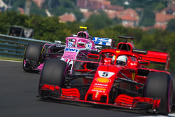 Esteban Ocon, Force India VJM11 and Sebastian Vettel, Ferrari SF71H