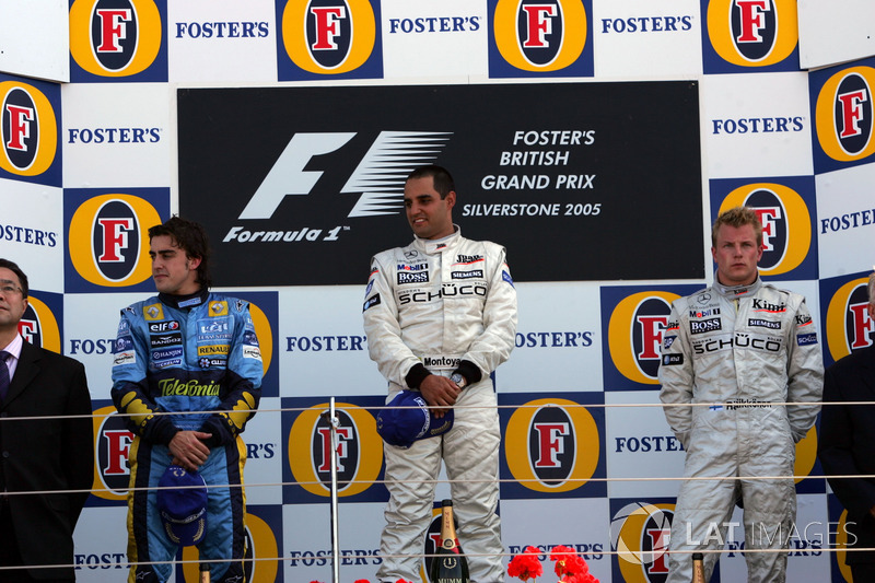 Podium: second place Fernando Alonso, Renault F1 Team, Race winner Juan Pablo Montoya, McLaren, third place Kimi Raikkonen, McLaren