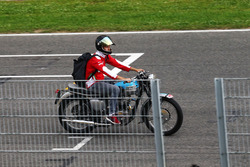 Sebastian Vettel, Ferrari on a Triumph motorbike