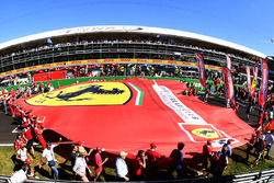 Fans and giant Ferrari flag