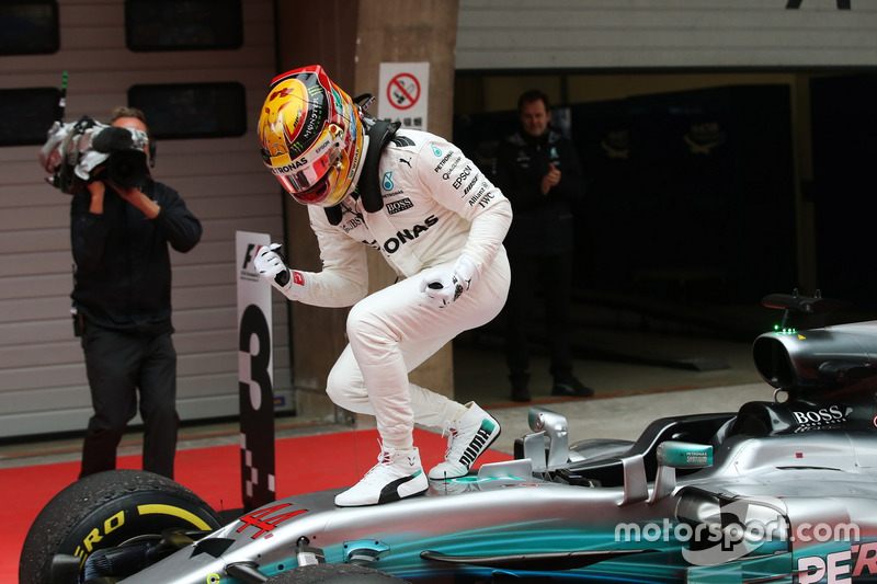 Race winner Lewis Hamilton, Mercedes AMG, celebrates in Parc Ferme