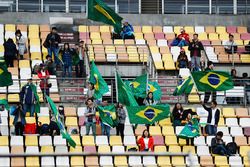 Chinese fans wave Brazilian flags