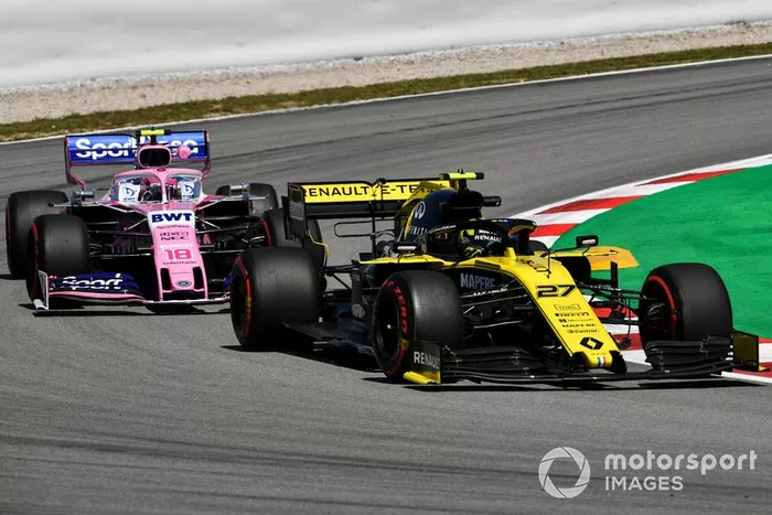 Nico Hulkenberg, Renault R.S. 19, y Lance Stroll, Racing Point RP19