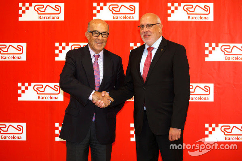 Carmelo Ezpeleta, CEO Dorna Sports dan Jordi Baiget, Menteri Bisnis dan Pengetahuan Catalunya