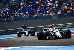 Charles Leclerc, Sauber C37, leads Valtteri Bottas, Mercedes AMG F1 W09