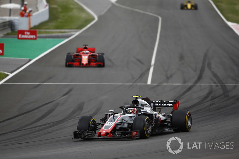 Kevin Magnussen, Haas F1 Team VF-18, Sebastian Vettel, Ferrari SF71H