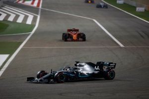 Lewis Hamilton, Mercedes AMG F1 W10, leads Sebastian Vettel, Ferrari SF90