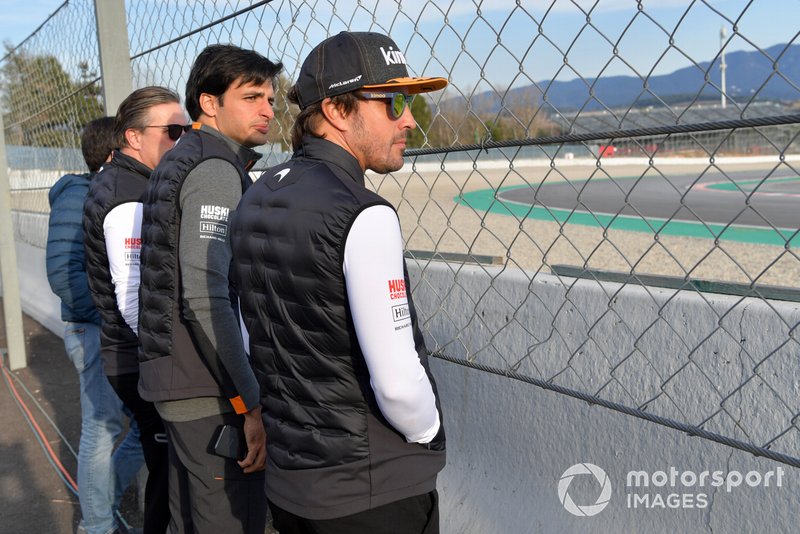 Zak Brown, McLaren Racing CEO, Carlos Sainz Jr., McLaren and Fernando Alonso watch the action trackside