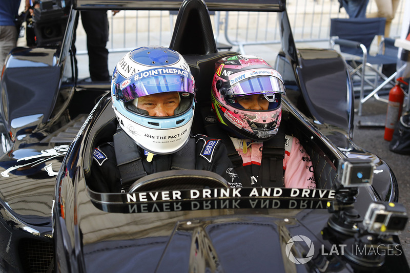 Mika Hakkinen takes Sergio Perez, Force India, for a ride