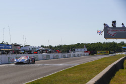 #67 Chip Ganassi Racing Ford GT, GTLM: Ryan Briscoe, Richard Westbrook, Crosses the Start / Finish Line under the Checkered Flag