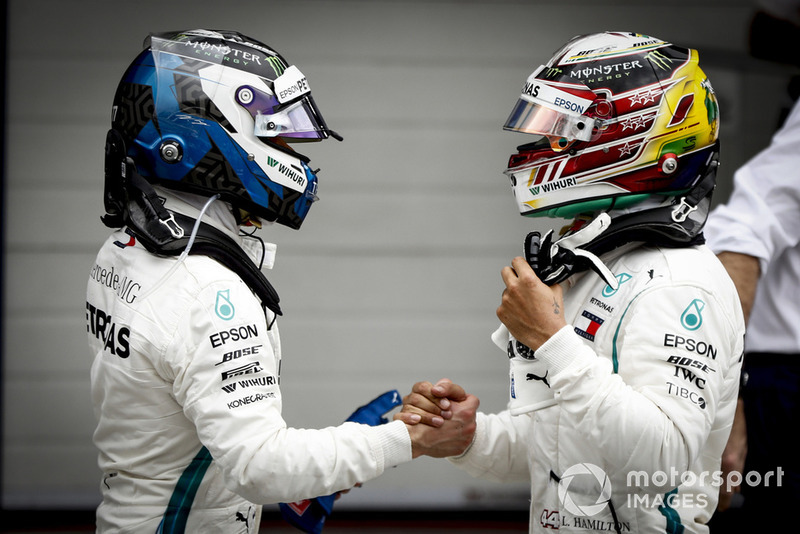 Valtteri Bottas, Mercedes AMG F1, congratulates team mate Lewis Hamilton, Mercedes AMG F1, on securing pole