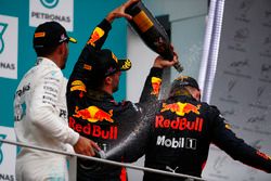 Lewis Hamilton, Mercedes AMG F1, Daniel Ricciardo, Red Bull Racing, spray champagne over winner Max Verstappen, Red Bull Racing, on the podium