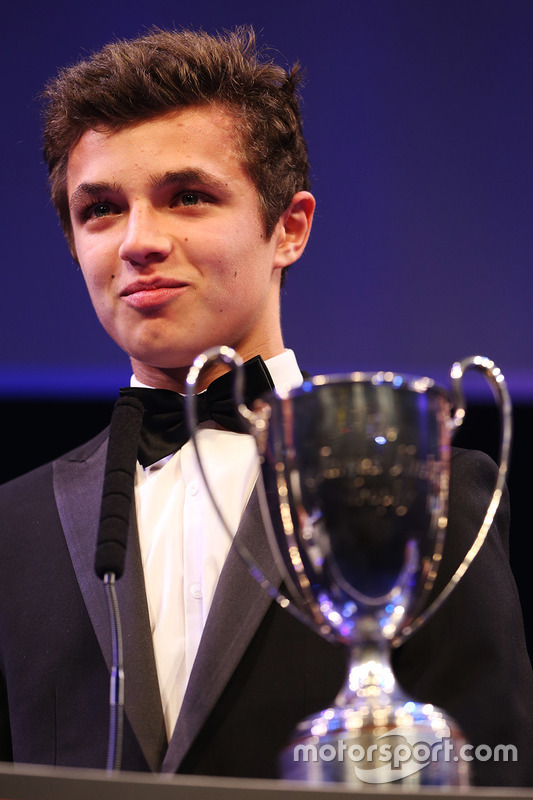 lando norris is presented with the british club driver of the