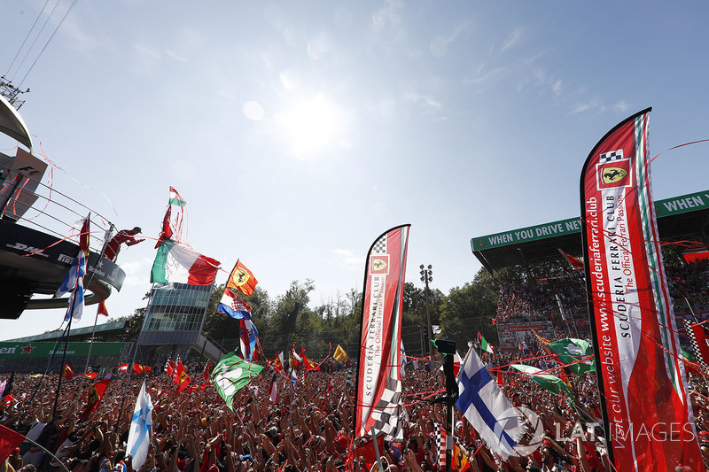 Third place Sebastian Vettel, Ferrari, celebrates, a partisan crowd