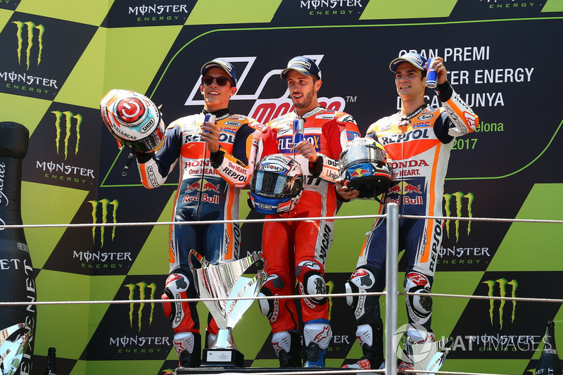 Podium : le deuxième, Marc Marquez, Repsol Honda Team, le vainqueur Andrea Dovizioso, Ducati Team, le troisième, Dani Pedrosa, Repsol Honda Team