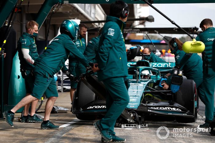 Sebastian Vettel, Aston Martin AMR22, in the pits