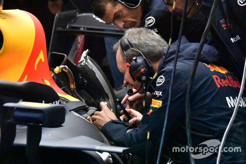 Red Bull Racing team members at work