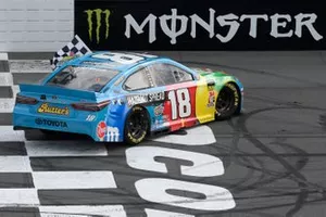 Kyle Busch, Joe Gibbs Racing, Toyota Camry M&M's Hazelnut, does a burnout after winning