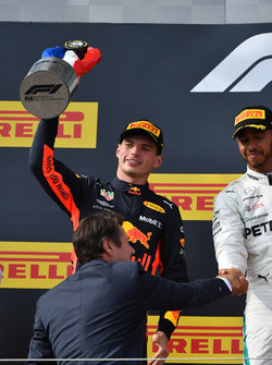 Max Verstappen, Red Bull Racing celebrates on the podium with the trophy