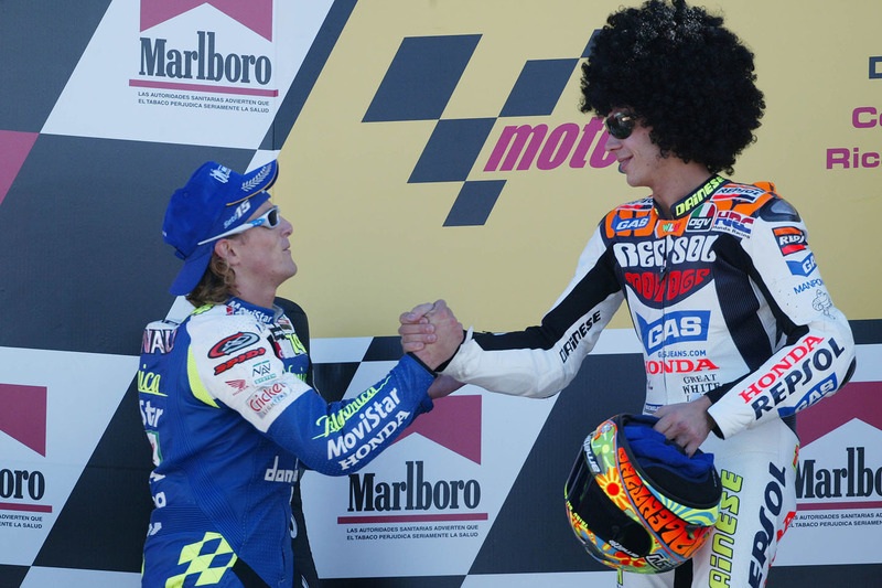 Podium: race winner Valentino Rossi, second place Sete Gibernau