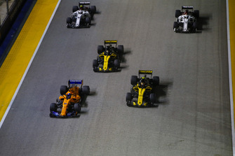 Fernando Alonso, McLaren MCL33, leads Carlos Sainz Jr., Renault Sport F1 Team R.S. 18, Nico Hulkenberg, Renault Sport F1 Team R.S. 18, Charles Leclerc, Sauber C37, and Marcus Ericsson, Sauber C37