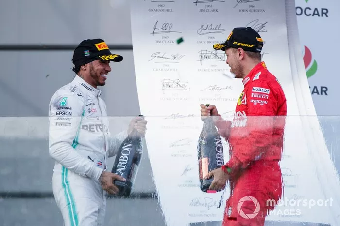 Podio: segundo lugar Lewis Hamilton, Mercedes AMG F1 y tercer lugar Sebastian Vettel, Ferrari