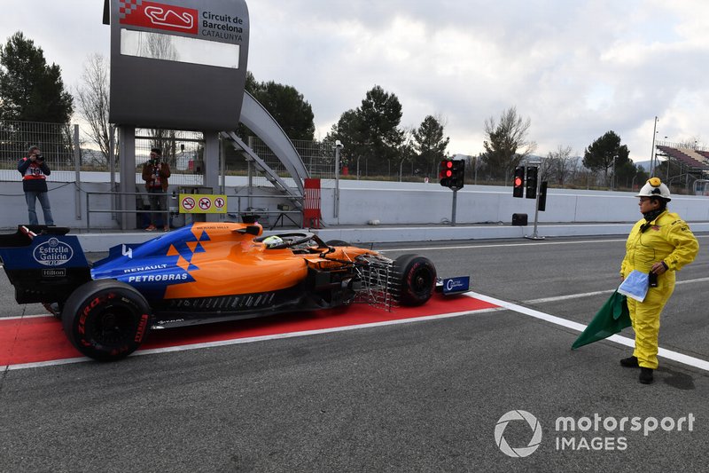 Lando Norris, McLaren MCL34 waits at the end of pit lane