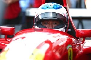 Jean Alesi prepares to drive the Ferrari