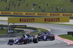 Carlos Sainz Jr., Scuderia Toro Rosso STR12 and Pierre Gasly, Scuderia Toro Rosso STR12