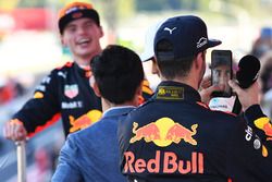 Daniel Ricciardo, Red Bull Racing celebrates with his phone on the podium