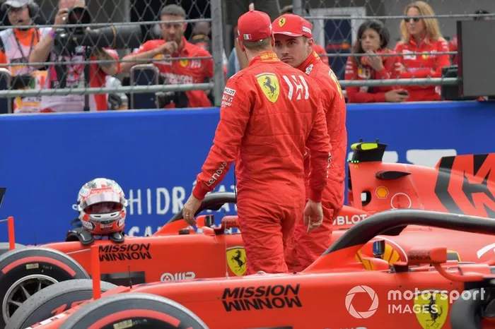 Charles Leclerc, Ferrari, and Sebastian Vettel, Ferrari, talk after Qualifying