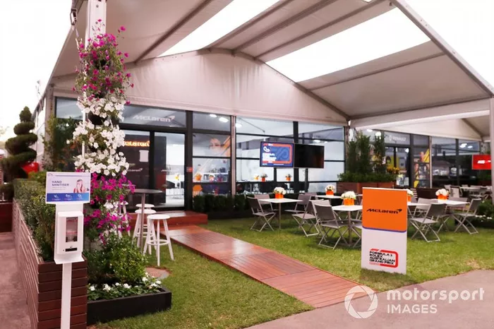 Hand Sanitiser dispenser outside the empty McLaren hospitality area in the paddock