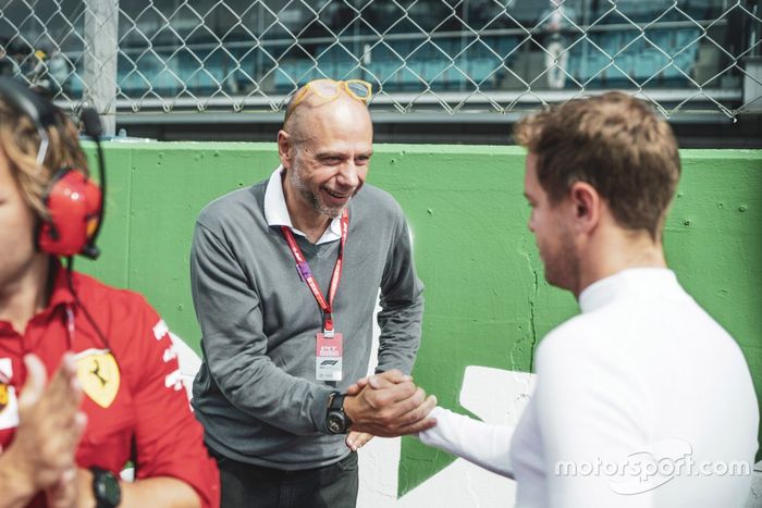 Sebastian Vettel, Ferrari  con un invitado
