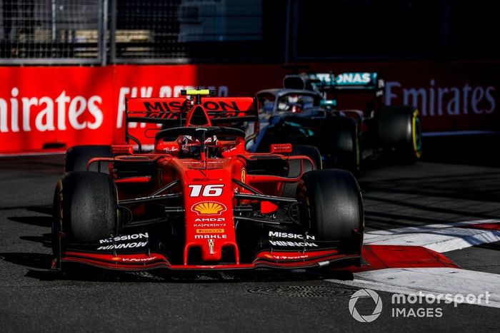 Charles Leclerc, Ferrari SF90 leads Lewis Hamilton, Mercedes AMG F1 W10 